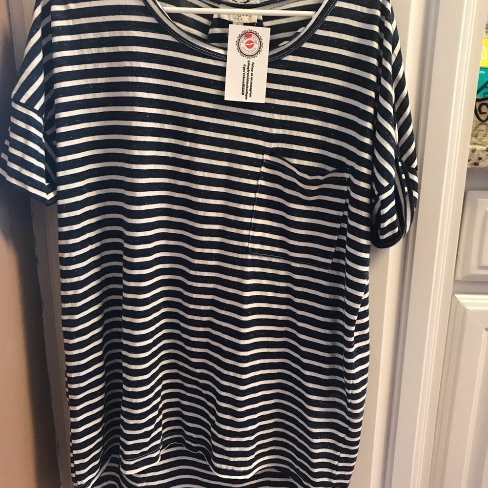 Women’s Umgee top purchased from a local boutique. New with tags.